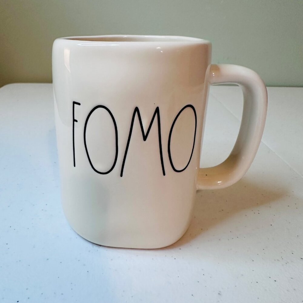 Rae Dunn "FOMO" Ceramic Coffee Mug White Black Text Elongated letters mug